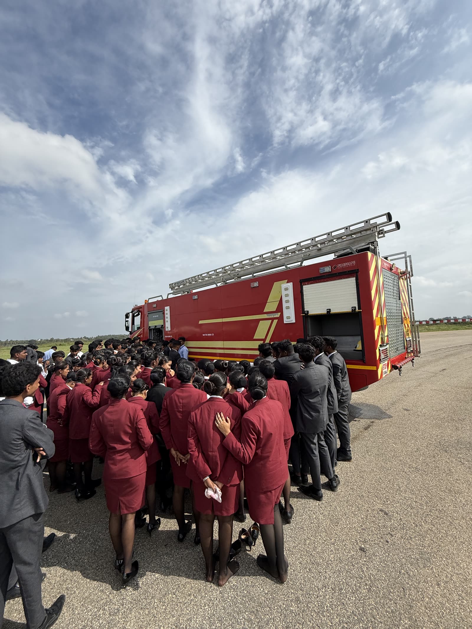 Trainees gathered at the Airport fire and rescue tender