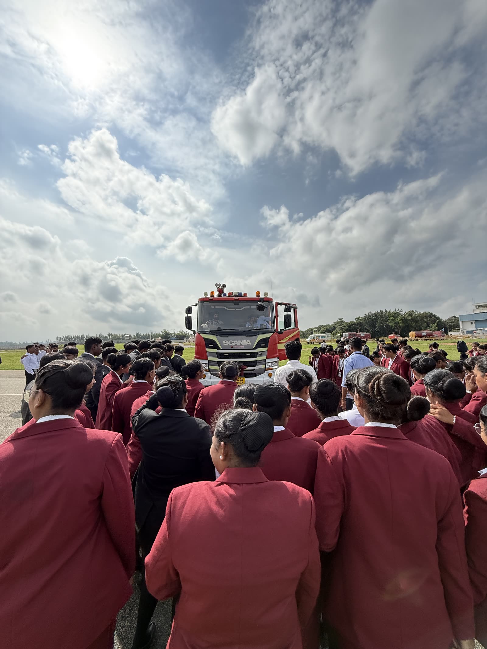 The cohort watching an Airport fire tender demonstration