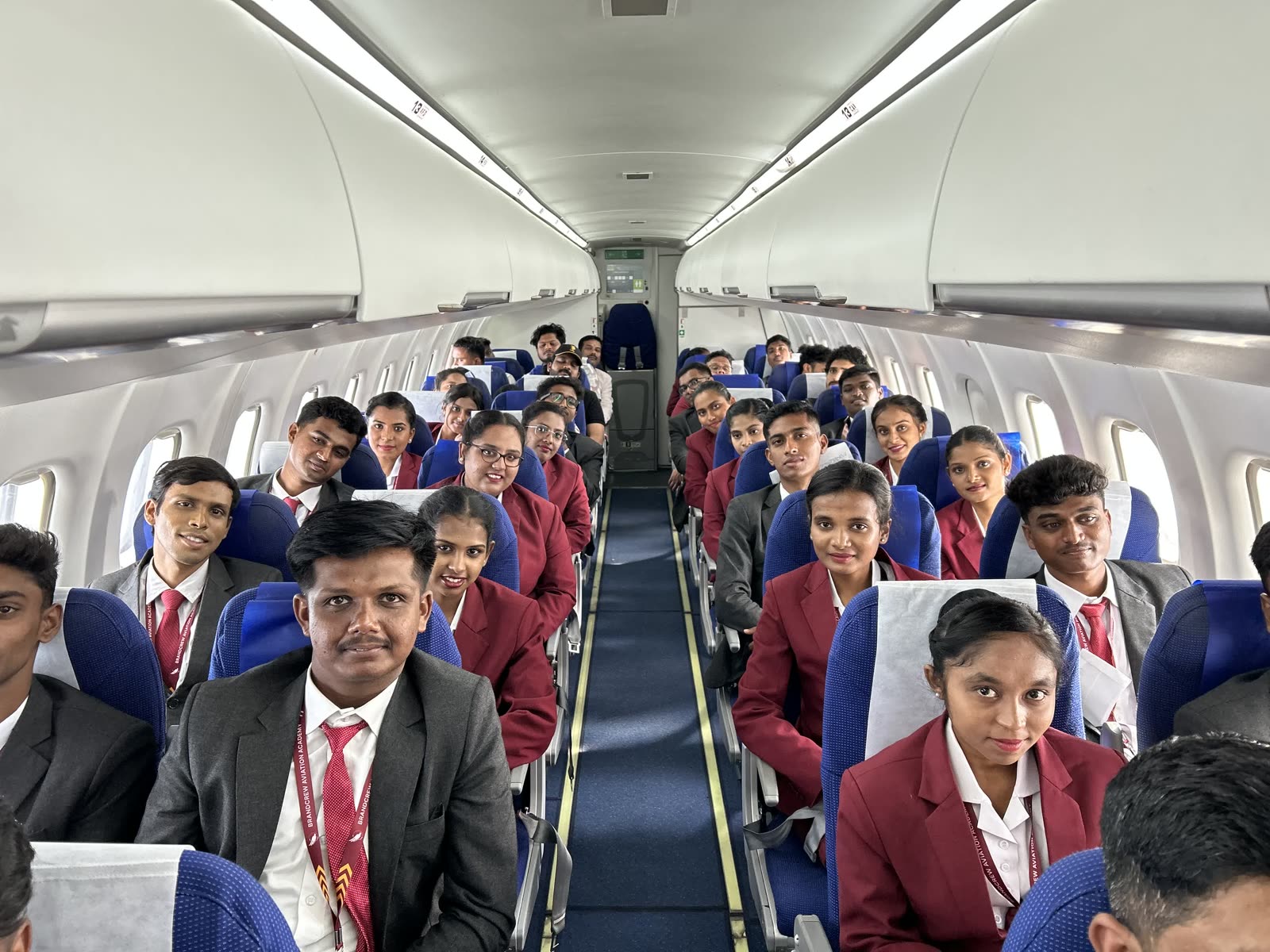 Brandcrew students inside the training aircraft cabin