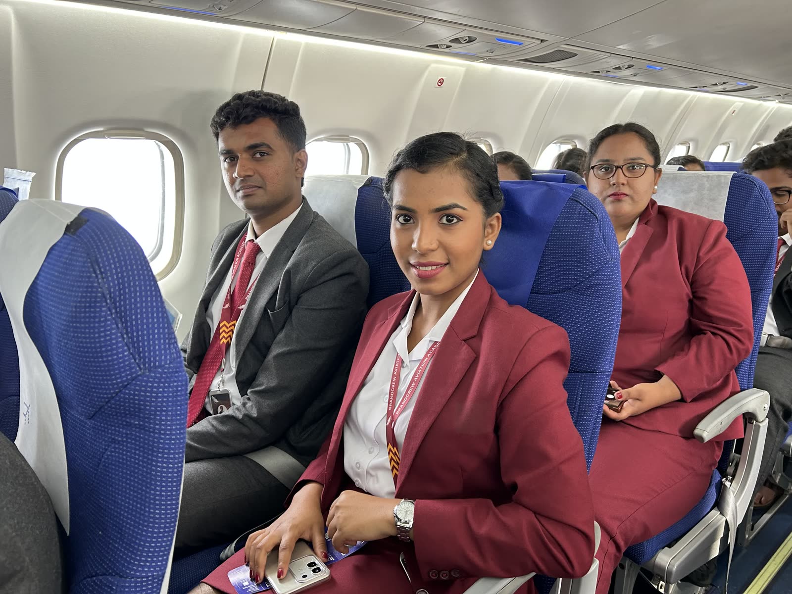 Brandcrew students inside the training aircraft cabin