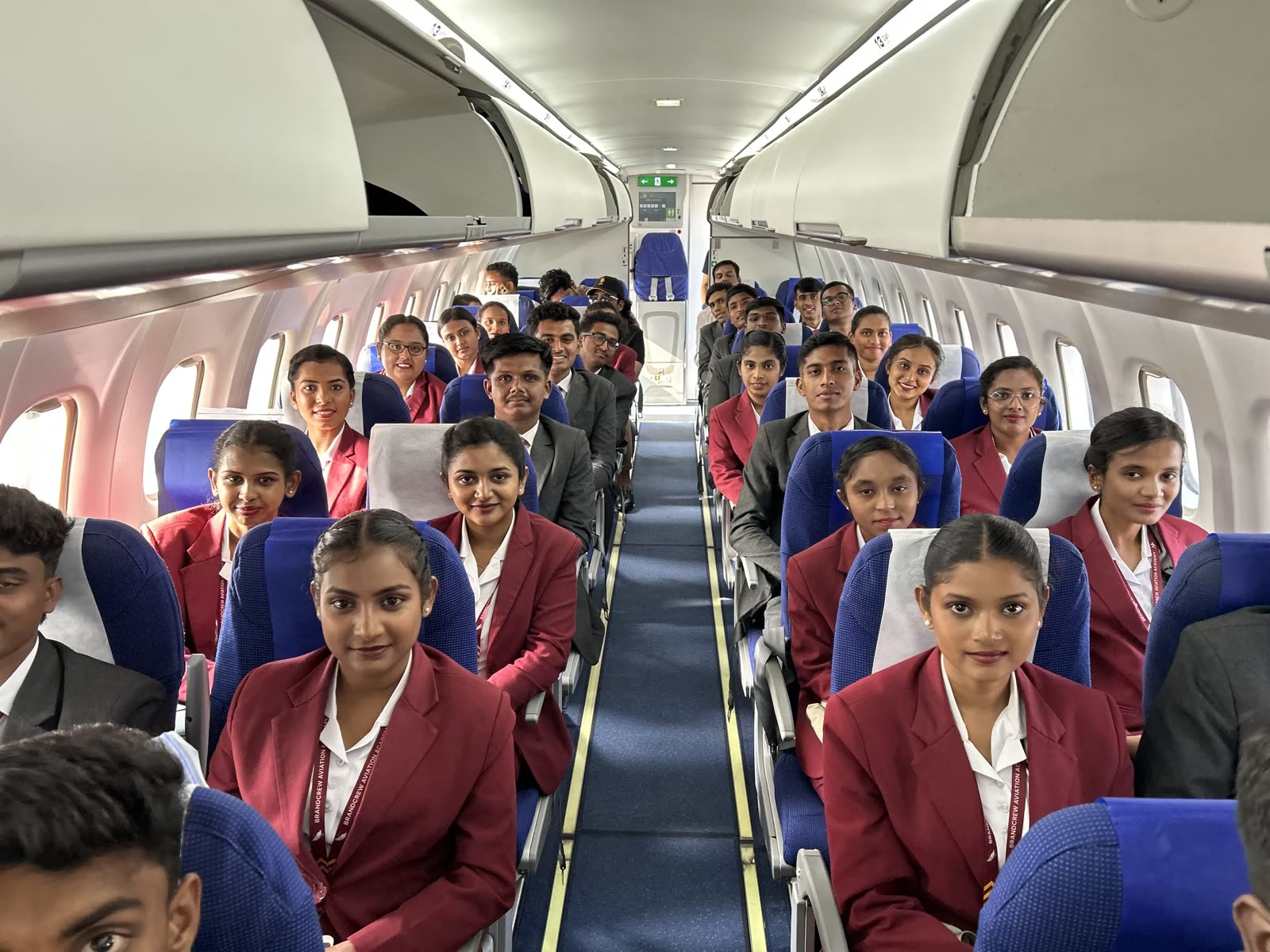 Brandcrew students inside the training aircraft cabin