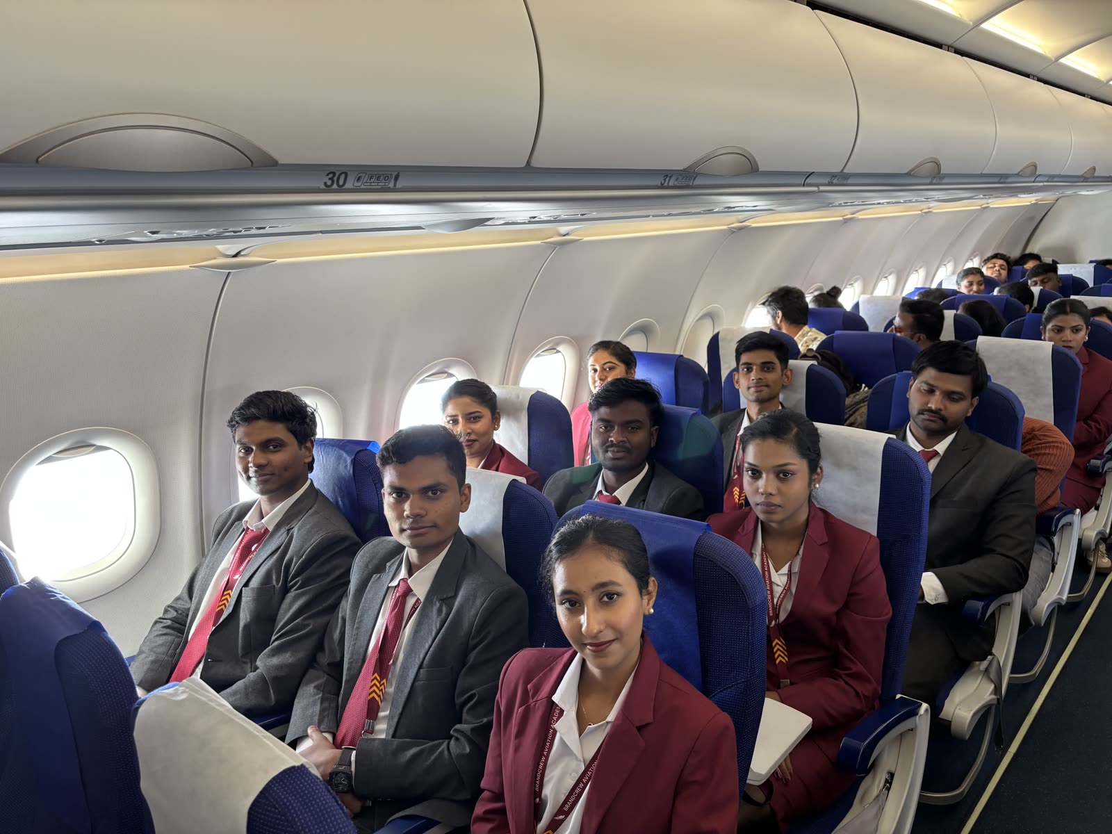 Brandcrew students inside the training aircraft cabin