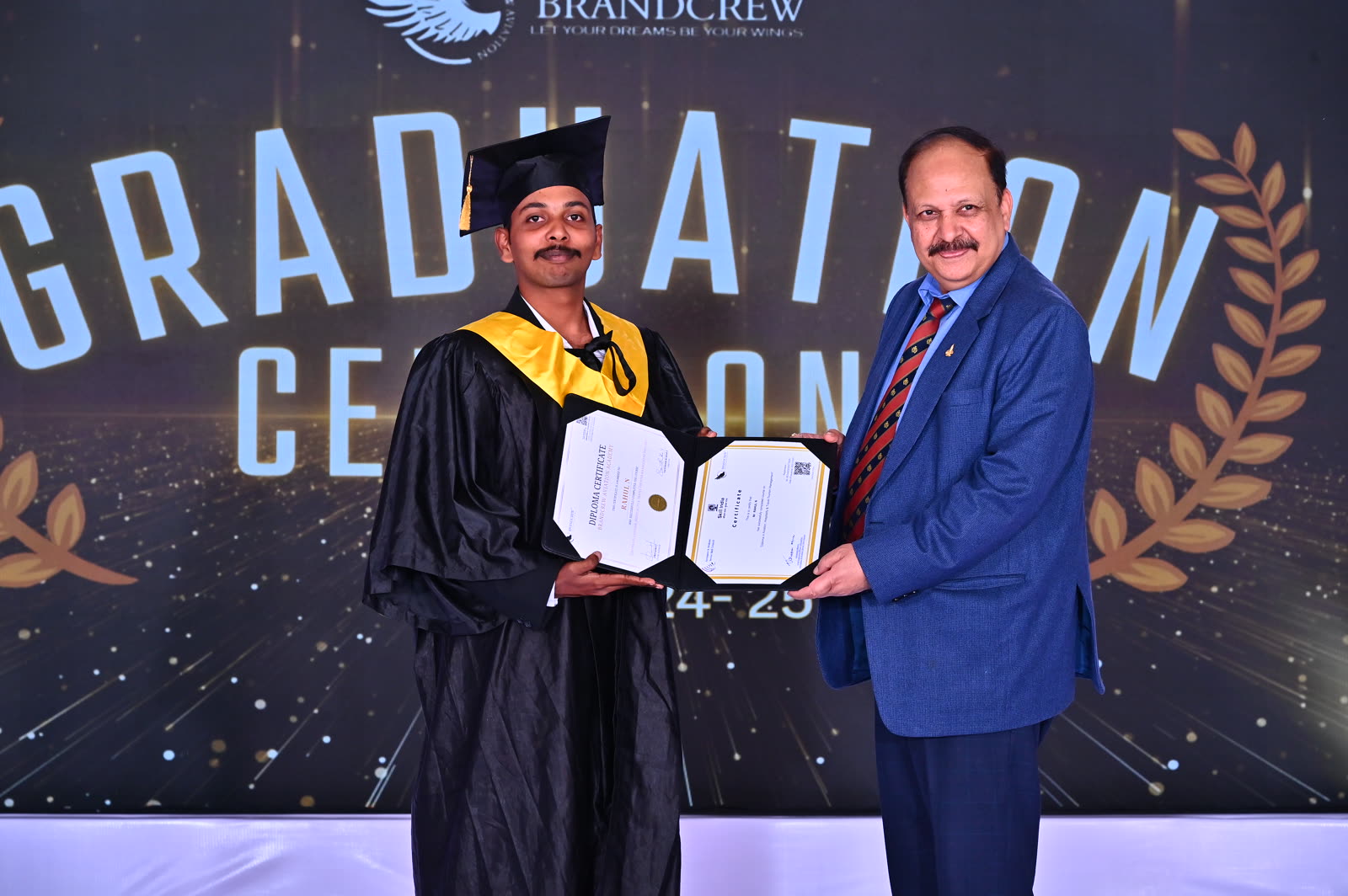 A Brandcrew student receiving their certificate at the graduation ceremony
