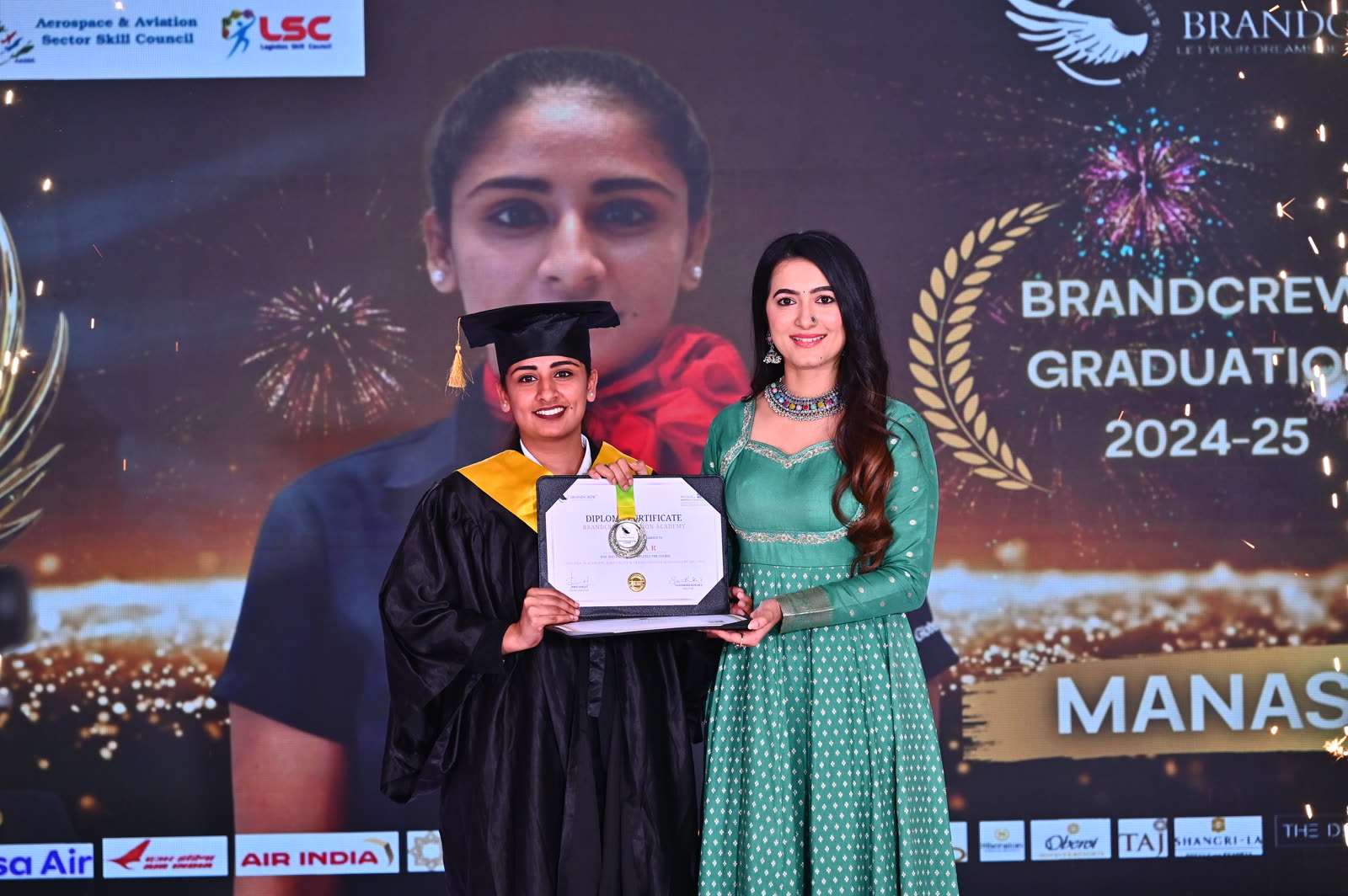 A Brandcrew student receiving their certificate at the graduation ceremony